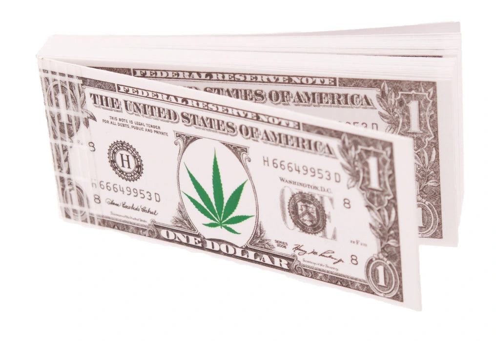 Dollar Roach Tips for rolling and smoking, showing a pack of small, reusable filter tips.